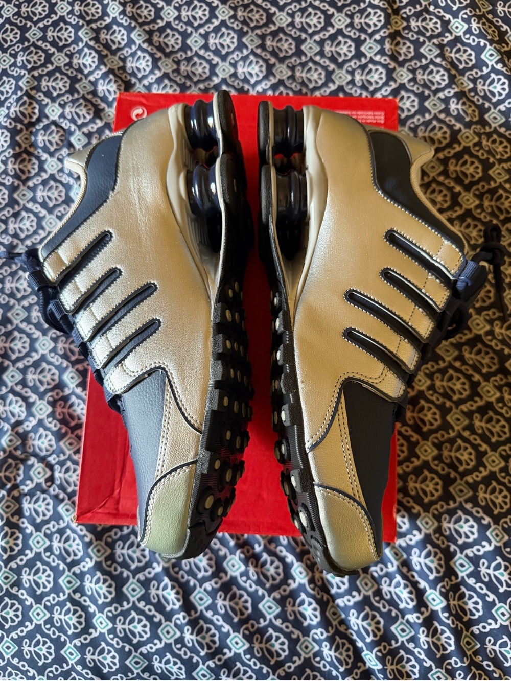 Men's Nike Shox athletic shoes in Blue and Silver